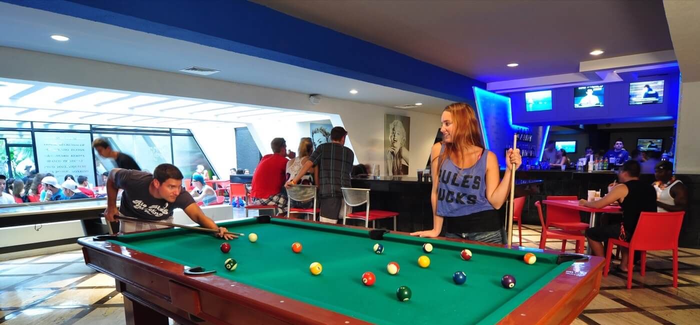 Image: PHOTO: Guests playing pool at The Pyramid at Grand Cancun. (photo via Oasis Hotels & Resorts)