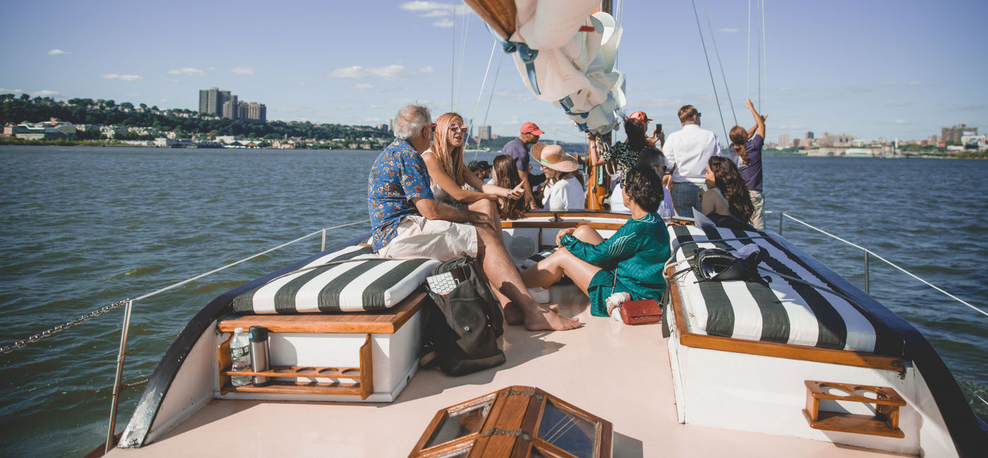 Image: PHOTO: Guests enjoy sailing aboard The Mark Hotel Sailboat. (Photo by Angela Pham via The Mark Hotel)