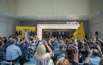 Brightline officials and local dignitaries watch as the Brightline Orlando Station is unveiled