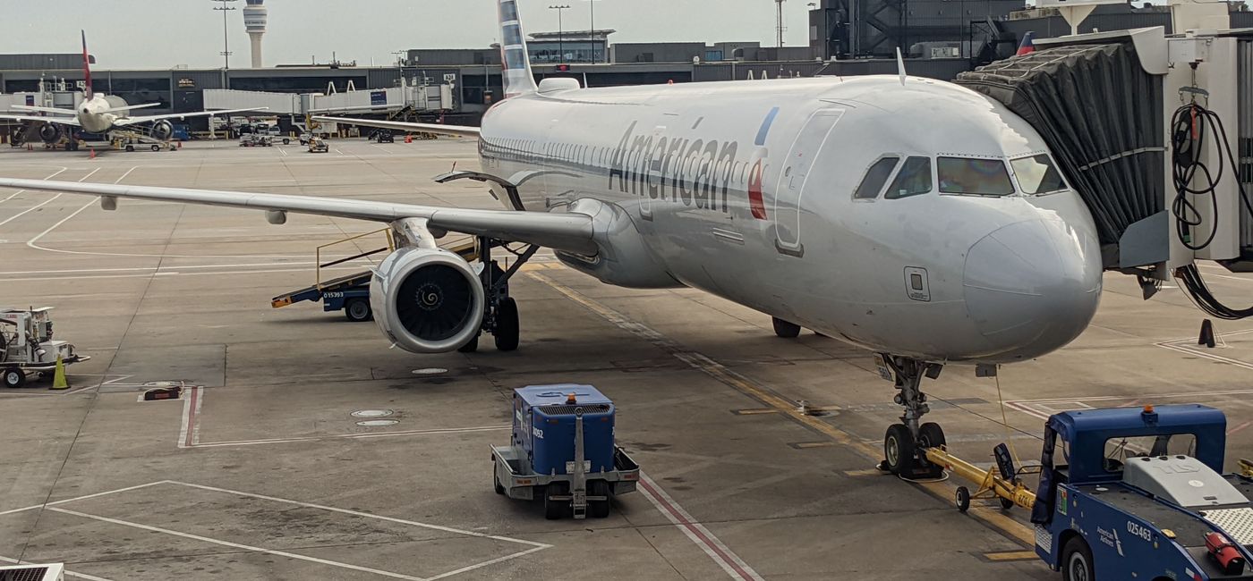 Image: American Airlines plane at airport gate. (photo by Eric Bowman)