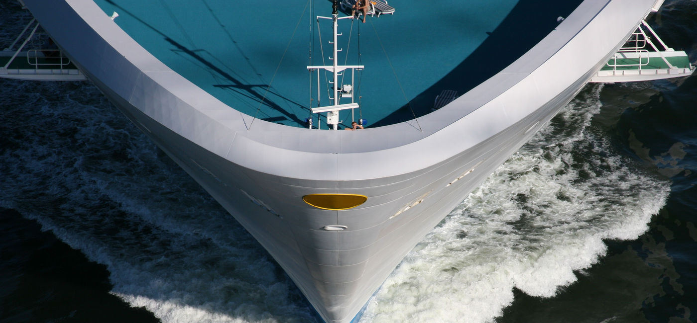 Image: Bow of cruise ship in ocean. (photo via zennie / E+)