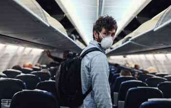 Man boarding an airplane.