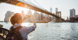 Traveler in New York City taking a picture