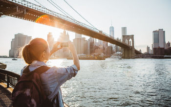 Traveler in New York City taking a picture