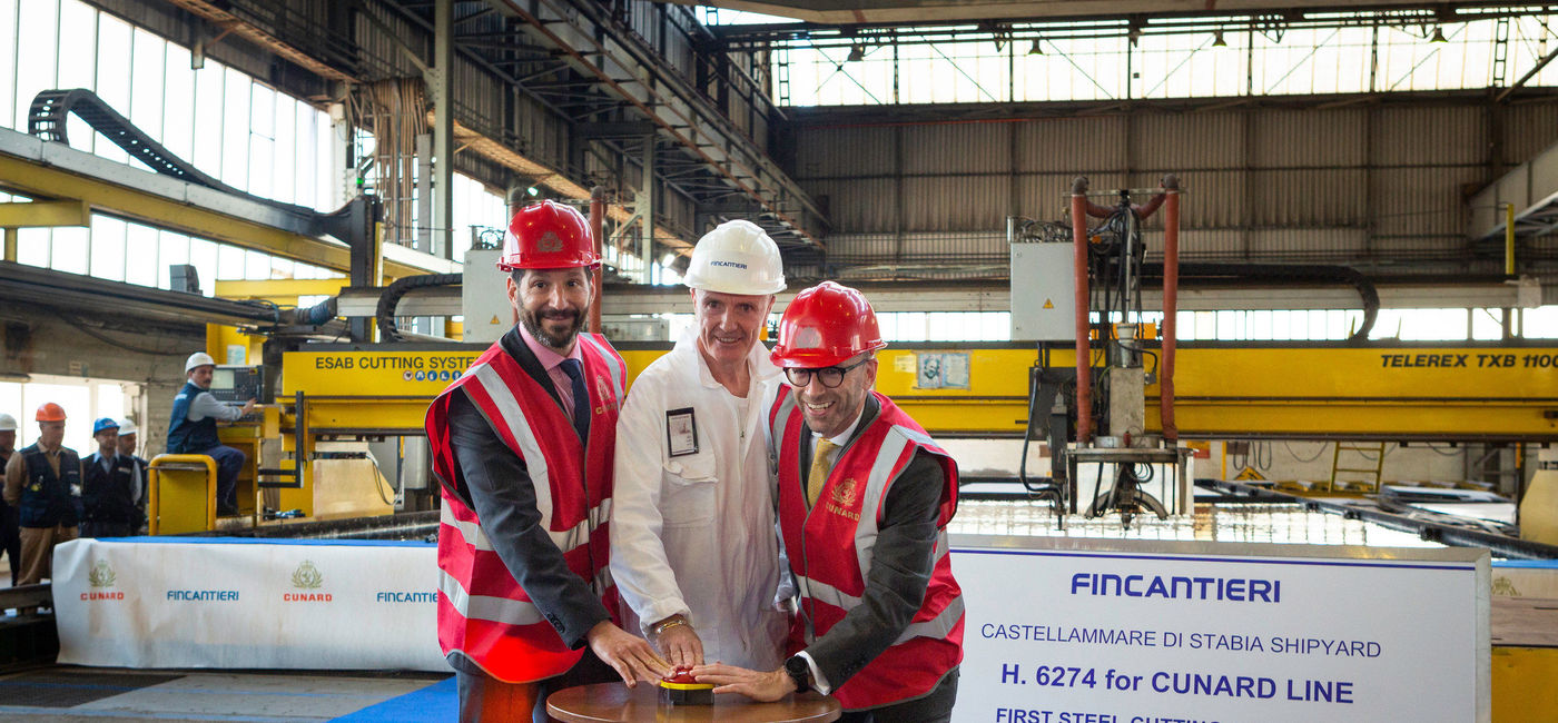 Image: PHOTO: (L-R) Josh Weinstein, President of Carnival UK Ltd, Gilberto Tobaldi, Shipyard Director from Fincantieri and Simon Palethorpe, President of Cunard push the button, starting the machine to cut the first piece of steel at the Fincantieri shipyard in Naples, Italy for Cunard's new, as yet unnamed, ship which will launch in 2022. (Photo courtesy of Cunard)