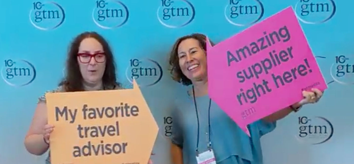Image: Travel advisor and supplier pose together at Global Travel Marketplace (Eric Bowman)