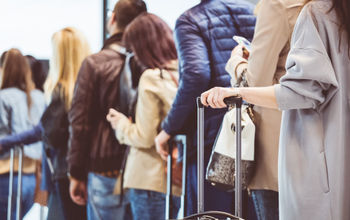 Line at airport security checkpoint.