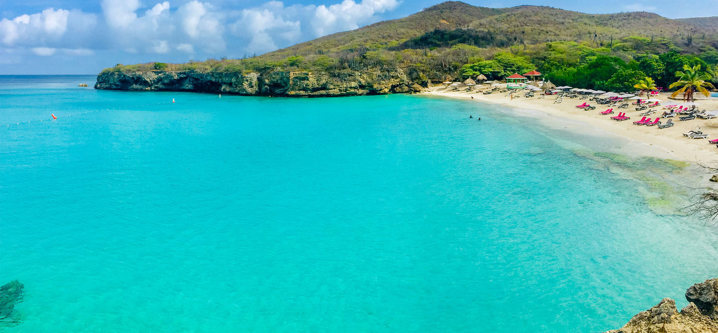 Image: PHOTO: Playa Kenepa Grandi, Curacao. (photo via Orietta Gaspari/iStock/Getty Images Plus)