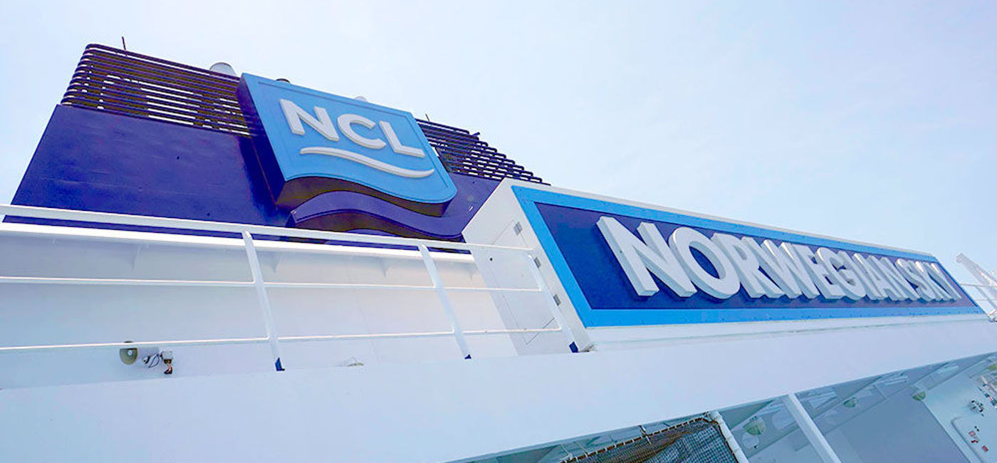 Image: PHOTO: Norwegian Sky's smokestack dons the Norwegian Cruise Line logo. (photo by Jason Leppert)
