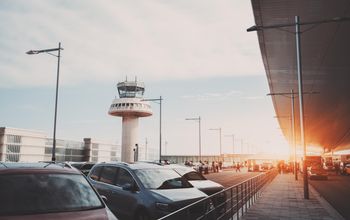 Parking lot of modern airport terminal