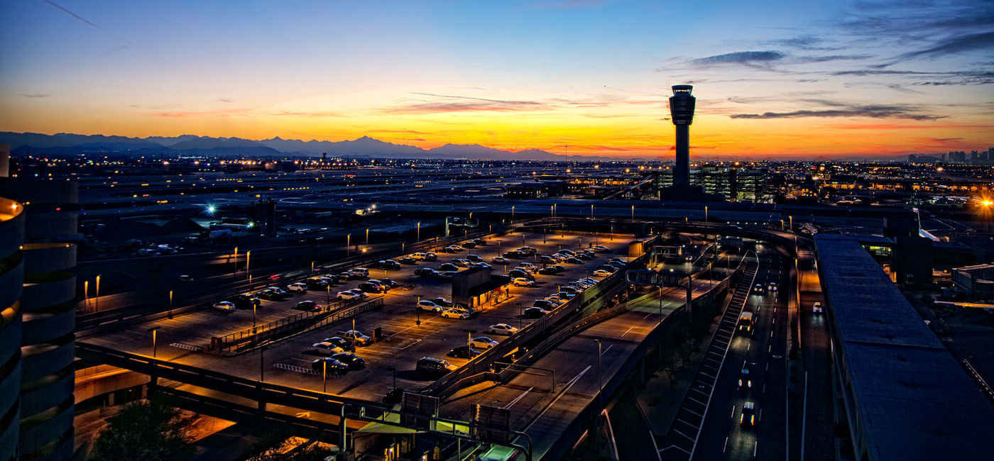 Image: PHOTO: Phoenix Sky Harbor International Airport at night. (photo via Flickr/Patrick Emerson)