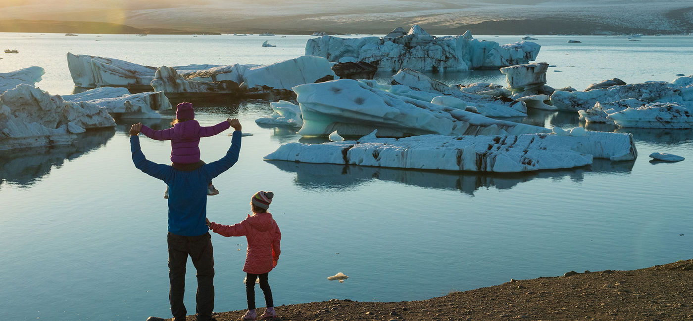 Image: A family visiting Iceland. (photo via stockstudioX/iStock/Getty Images Plus)