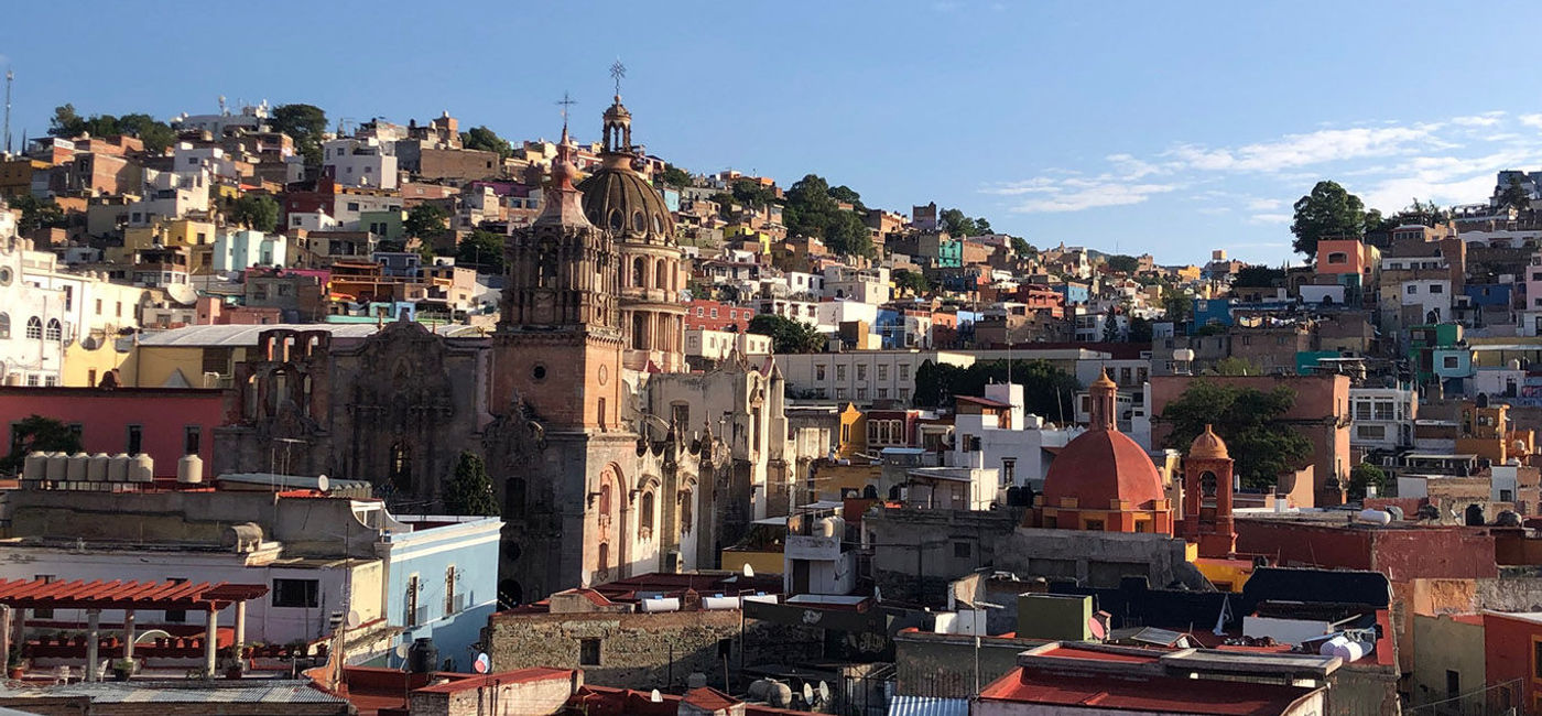 Image: The early morning sun shines on central Guanajuato City, as seen from the roof of the Edelmira Hotel Boutique. (Photo by Paul Heney) (Photo by Paul Heney.)