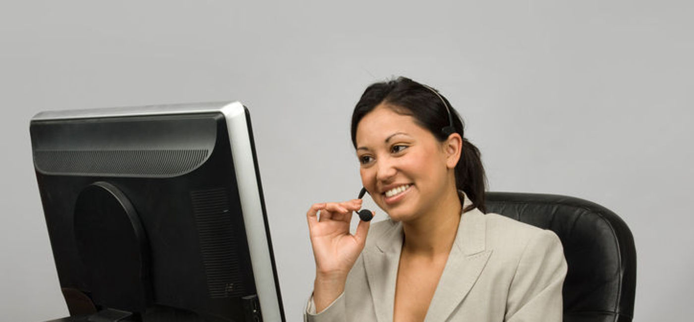 Image: Customer service agent using a phone headset. (photo courtesy of Thinkstock)