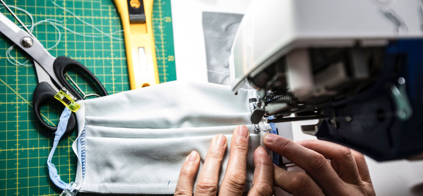Image: PHOTO: Woman sewing face masks during COVID-19 pandemic. (Photo via iStock/Getty Images E+/kmatija)