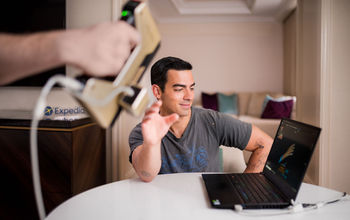 Joe Jonas's right hand is captured to ensure an exact replica for the Expedia Helping Hand.