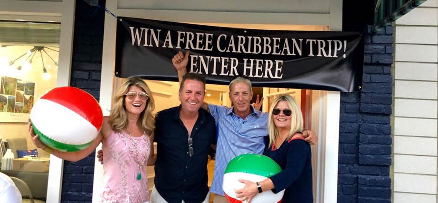 Image: Tom Carr, second from left, at Preferred Vacations with (l-r) agent Kelly Stull, repeat client Bill Lewis and Tom's wife Dianne. (Tom Carr)