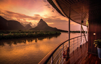 A Pandaw Expeditions river cruise sailing Halong Bay and the Red River.
