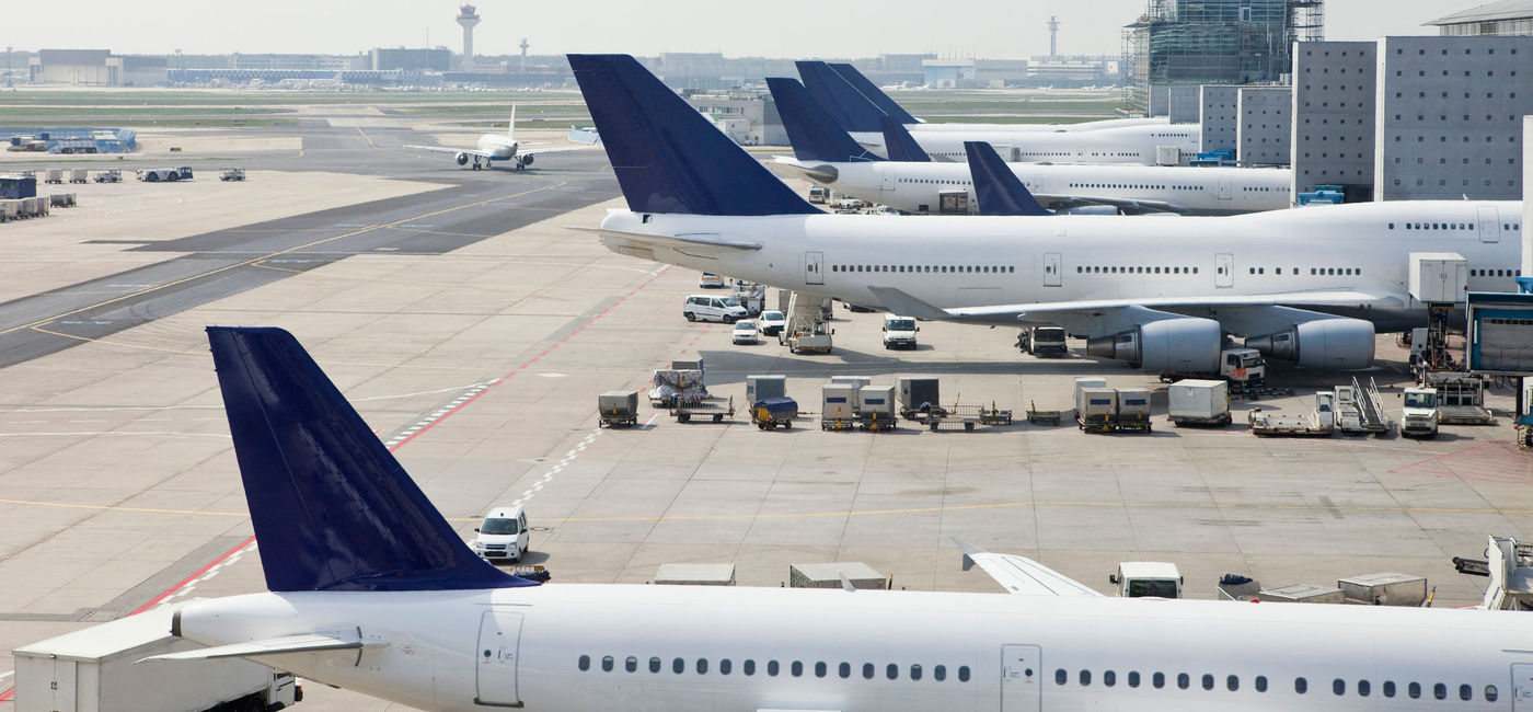 Image: Airplanes parked in their allotted airport slots.  (Photo Credit: iStock/Getty Images E+/mbbirdy)