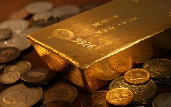 Gold bar and coins