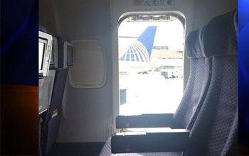 The open emergency door where a woman jumped out at Houston airport. 