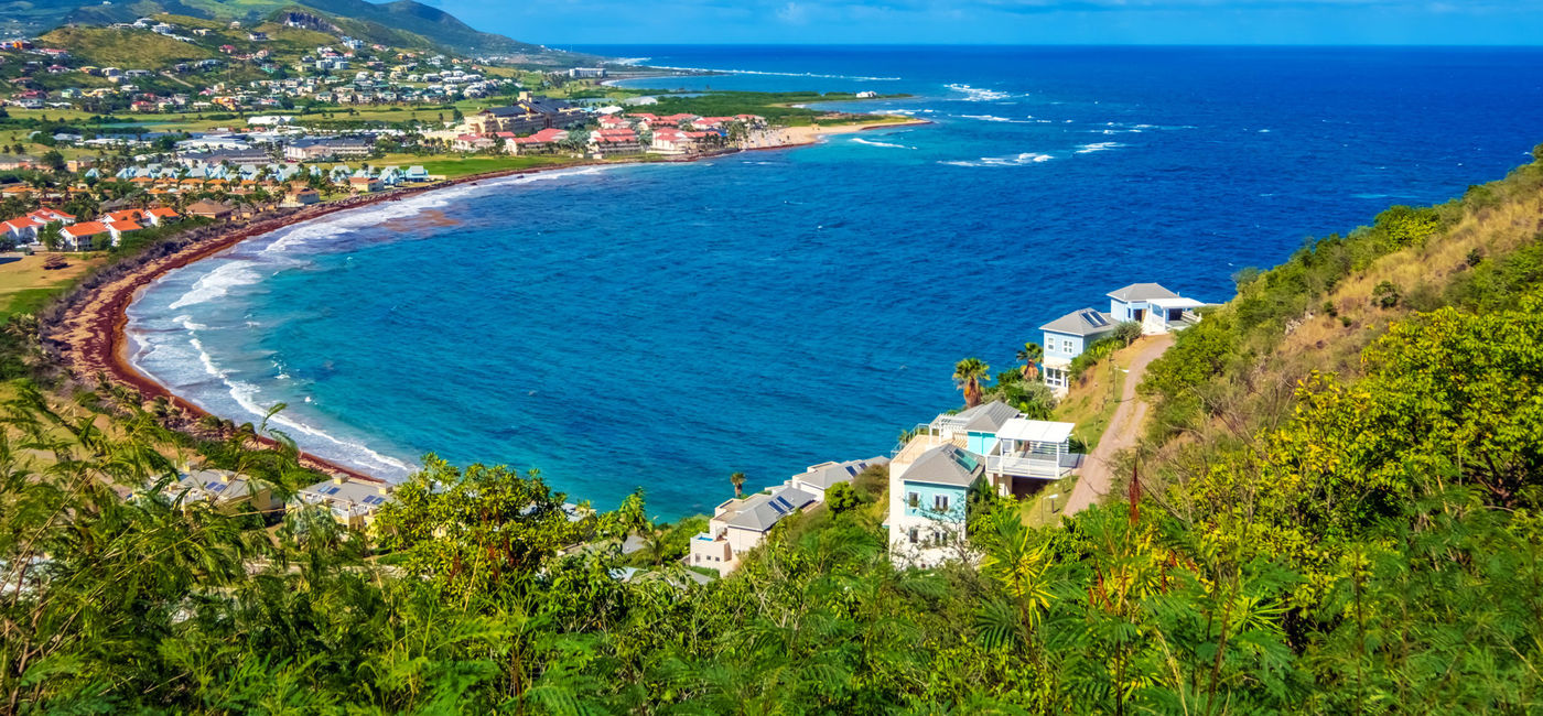 Image: The view from Timothy Hill overlooking Basseterre, the capital of St. Kitts and Nevis. (photo via iStock/Getty Images Plus/BriBar)