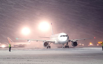 Airport and airplanes in a blizzard
