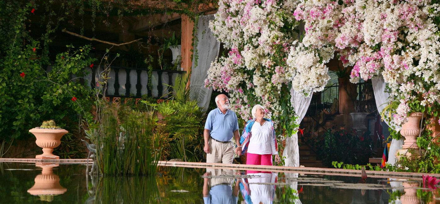 Image: A couple walks through the Vallarta Botanical Gardens. (photo via Puerto Vallarta) ((photo via Puerto Vallarta))