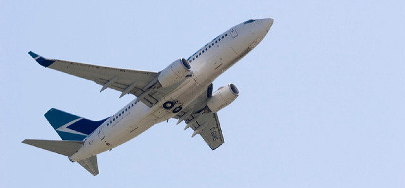 Image: PHOTO: WestJet Boeing 737 in flight. (photo via Flickr/TMWolf)