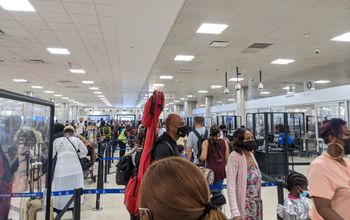 Travelers in security line at the airport