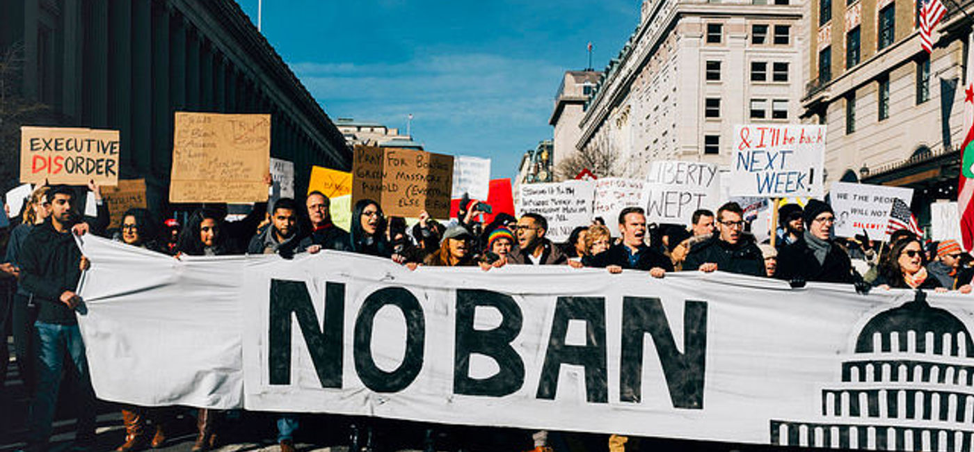 Image: PHOTO: Travel Ban protest. (photo via Flickr/Masha George) (Flcikr/Masha George)