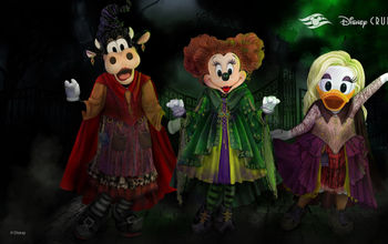 Minnie Mouse, Daisy Duck and Clarabelle Cow dressed like the Sanderson Sisters from Hocus Pocus.