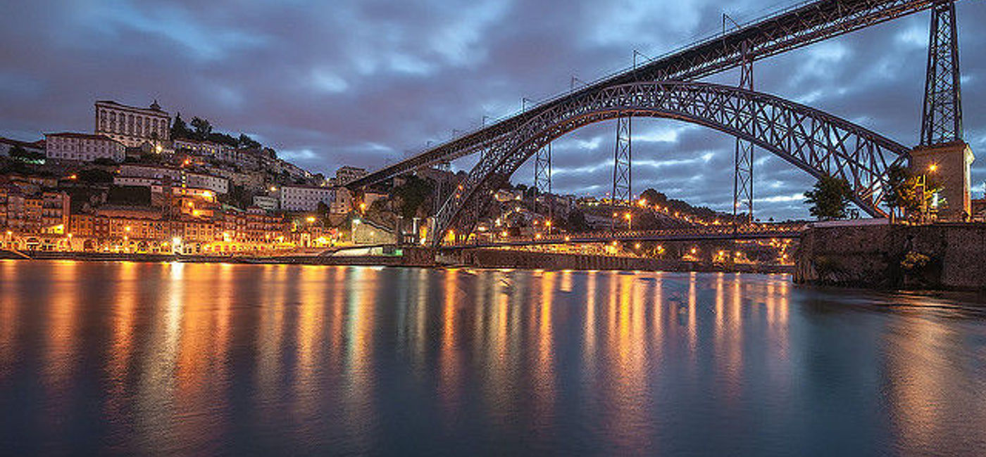 Image: PHOTO: The city of Oporto, Portugal, awakens next to the Douro River. (Courtesy Flickr/Rossana Ferreira)