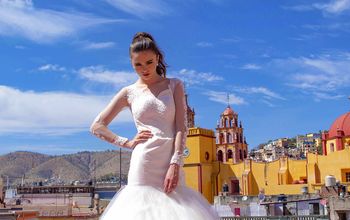 A bride poses in front of a historic church San Miguel de Allende, Guanajuato, Mexico.