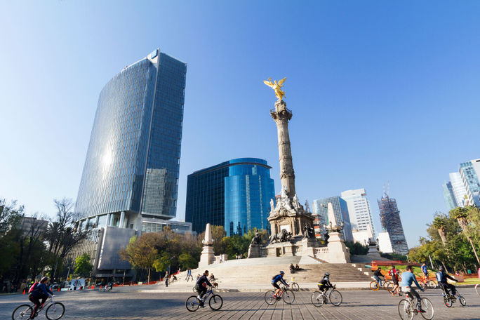 Cyclists at the Mexico City Sunday ride along Paseo de la Reforma Cyclists at the Mexico City Sunday ride along Paseo de la Reforma