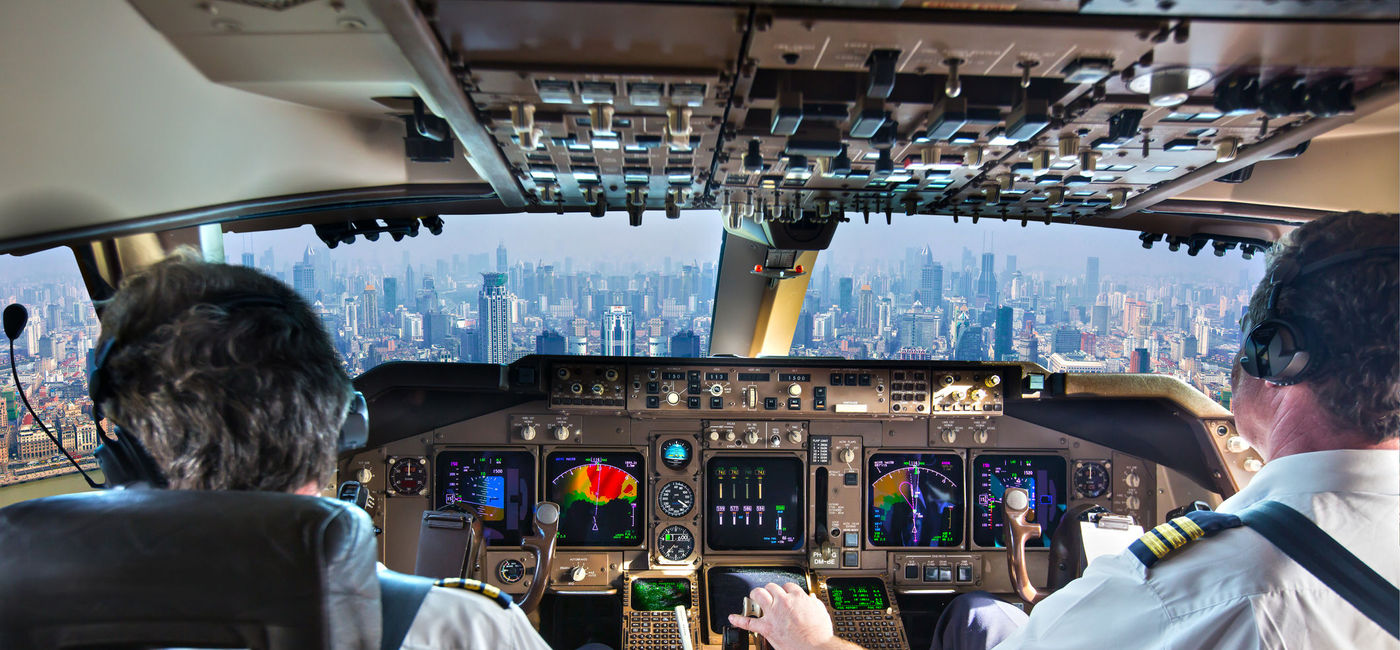 Image: Pilots check the instrumentation on the flight deck prior to a flight. (photo via iStock/Getty Images Plus/AlexeyPetrov)