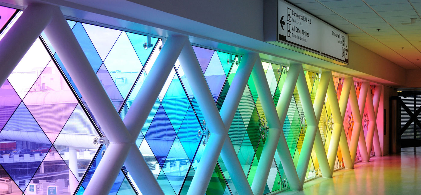 Image: Hallway of Miami International Airport. (photo via aimintang / iStock / Getty Images Plus)