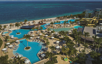 Panoramic view of Dreams Natura Resort & Spa's pools and water park