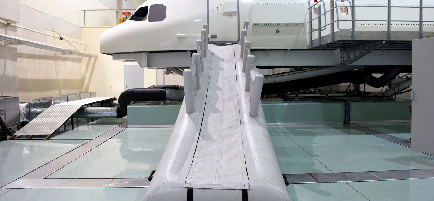 Image: PHOTO: Aircraft emergency slide. (photo via baranozdemir / iStock / Getty Images Plus)