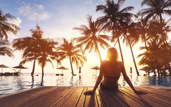 Woman enjoying a solo vacation in the Caribbean