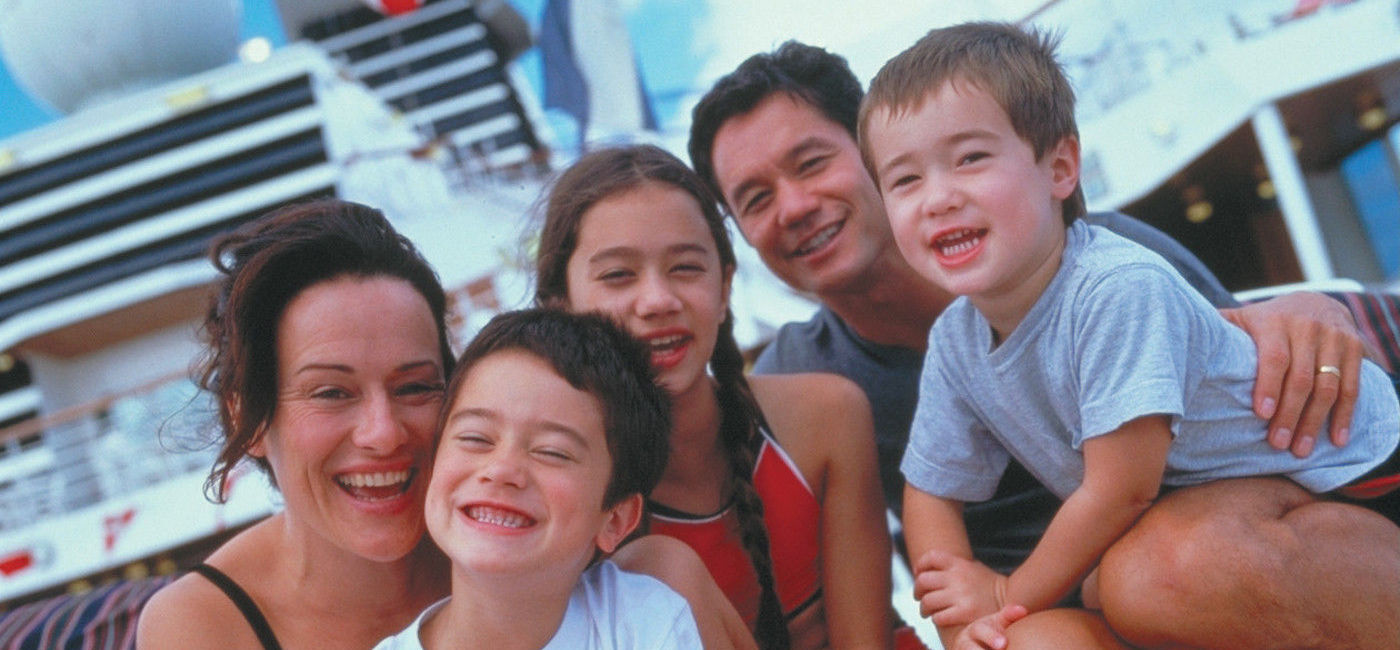 Image: Family with kids sailing aboard a cruise ship. (photo via Holland America Line)