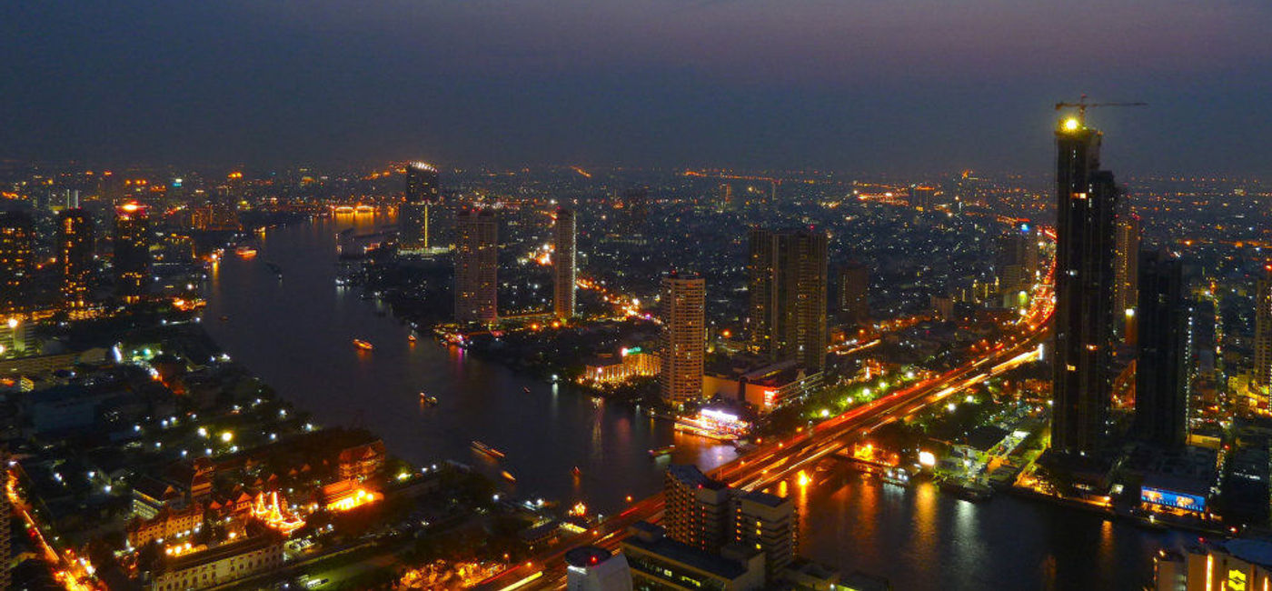 Image: PHOTO: Enjoy a breathtaking view of Bangkok from the city's famed Sky Bar located at The Dome at lebua's State Tower. (photo via Flickr/Daniel Peherstorfer)