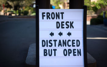 Hotel signage promoting social distancing