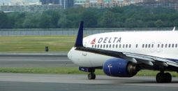 A Delta Air Lines plane taxiing at Ronald Reagan Washington National Airport