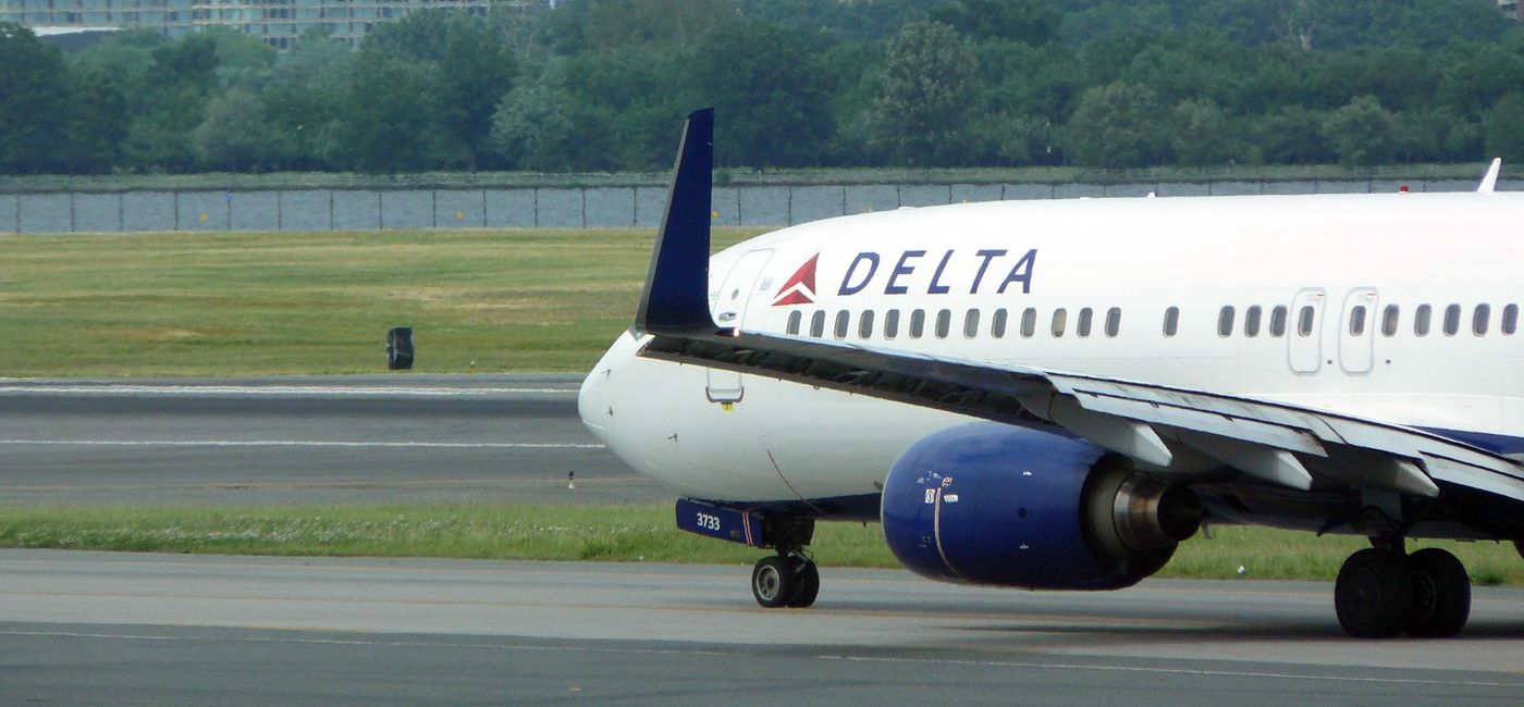 Image: A Delta Air Lines plane taxiing at Ronald Reagan Washington National Airport. (photo via kortemeyer/iStock Editorial/Getty Images Plus)