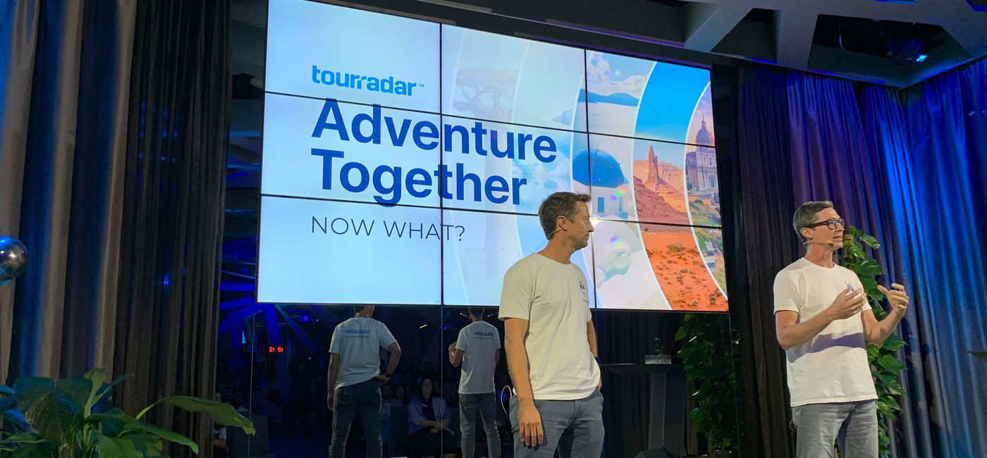 Image: Travis and Shawn Pittman, co-founders of TourRadar, speak at the hybrid Adventure Together event in Vienna. (photo via TourRadar) ((photo via TourRadar))