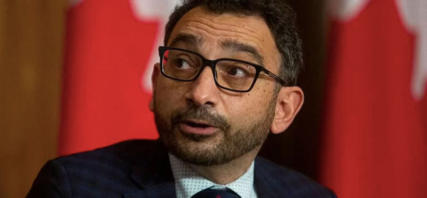 Image: The federal government says it is taking action to reduce wait times at Canadian airports. (Transport Minister Omar Alghabra)
