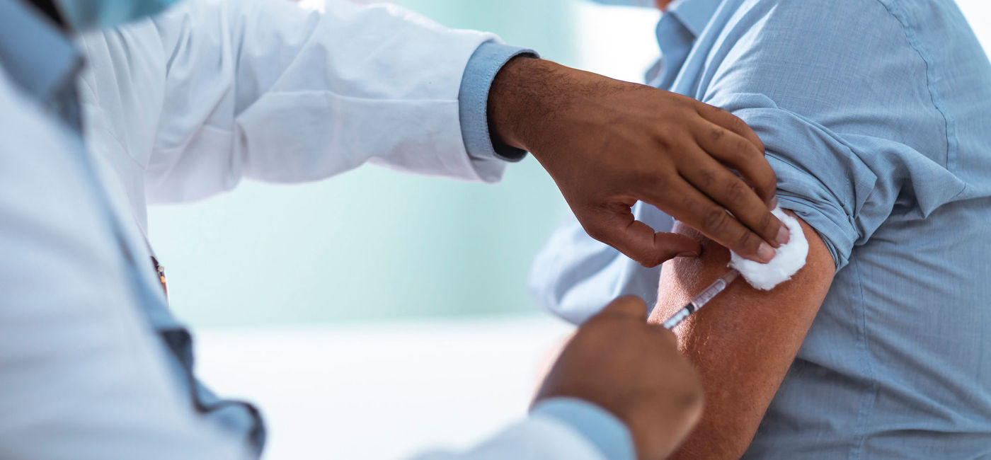 Image: Man receiving a vaccination. (photo via iStock/Getty Images E+/Geber86)