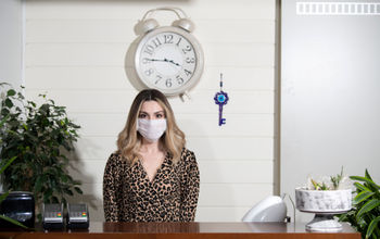 Hotel employee wearing a face mask