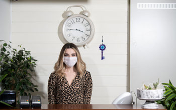 Hotel employee wearing a face mask